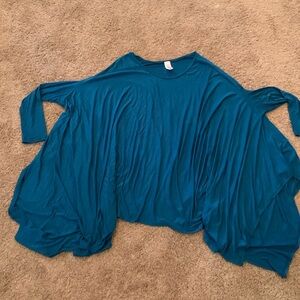 Woman’s cape style top